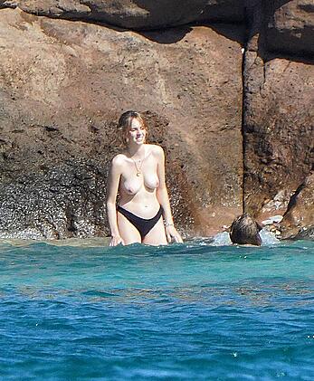 Maya Hawke topless on a beach at St. Barts with her mom Uma Thurman