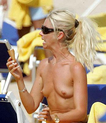 Tamara Beckwith sunbathing topless in Italy