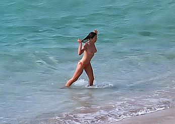 Elizabeth Hurley topless on a beach paparazzi shots