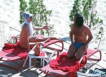 Elizabeth Hurley topless on a beach paparazzi shots