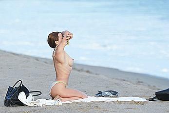 Francesca Eastwood topless on the beach in Malibu