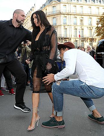 Kim Kardashian has her ass kissed by journalist Vitalii Sediuk in Paris