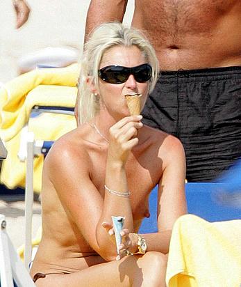 Tamara Beckwith sunbathing topless in Italy