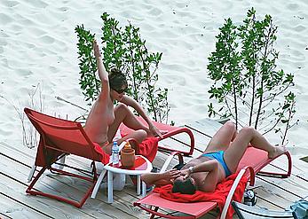 Elizabeth Hurley topless on a beach paparazzi shots