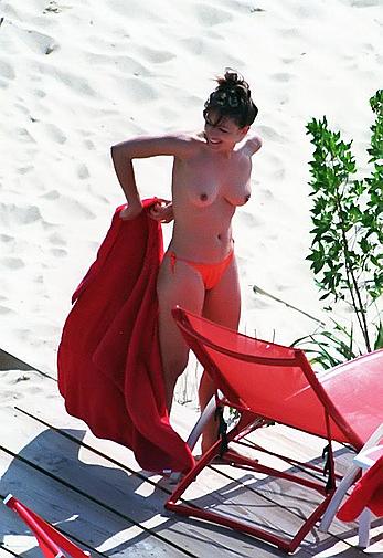 Elizabeth Hurley topless on a beach paparazzi shots