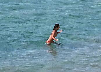 Elizabeth Hurley topless on a beach paparazzi shots