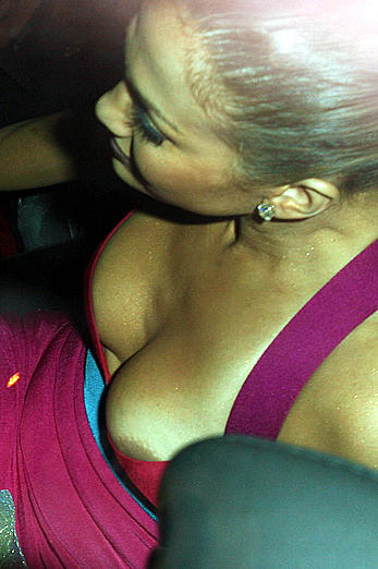 Jennifer Lopez areola slip in a car paparazzi shots