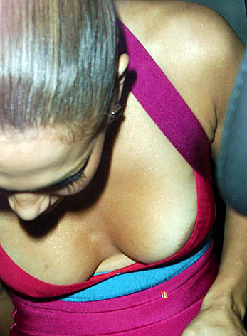 Jennifer Lopez areola slip in a car paparazzi shots