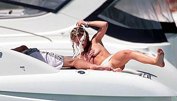 Abigail Clancy caught topless on a yacht