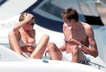 Abigail Clancy caught topless on a yacht