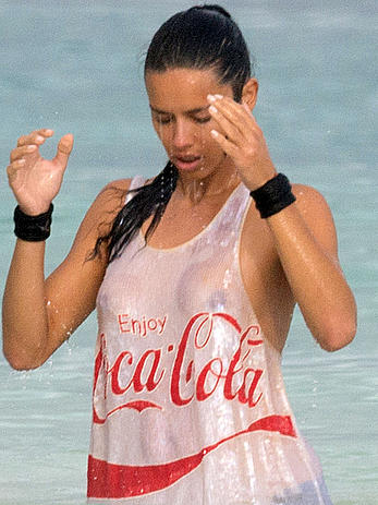 Adriana Lima in a see through wet top behind the scene of a photoshoot in Cancun