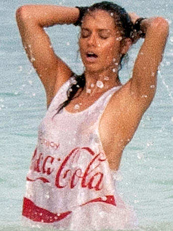 Adriana Lima in a see through wet top behind the scene of a photoshoot in Cancun