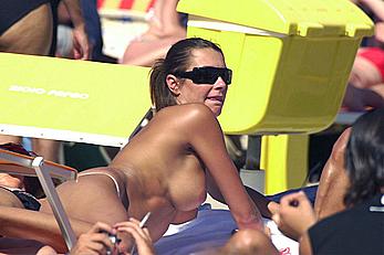 Alena Seredova topless on a beach with honey