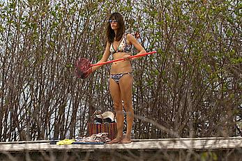 Supermodel Alessandra Ambrosio in bikini on a beach in Brazil