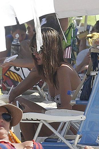 Alessandra Ambrosio in bikini on the beach in Florianopolis