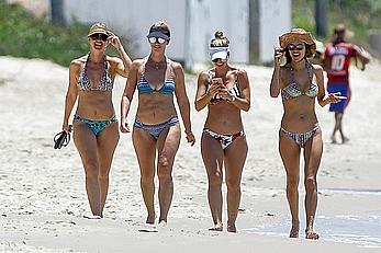 Alessandra Ambrosio sips on coconut at the beach in Brazil