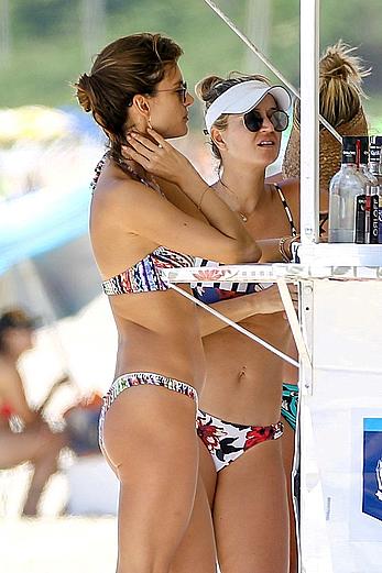 Alessandra Ambrosio sips on coconut at the beach in Brazil