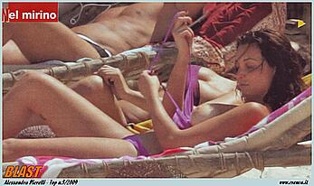 Italian actress Alessandra Pierelli topless on a beach paparazzi photos