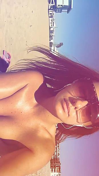 Alexandra Stan topless enjoys a sunny day on the beach