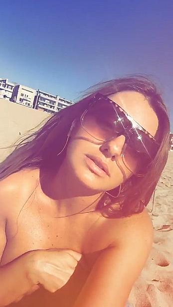 Alexandra Stan topless enjoys a sunny day on the beach