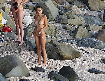 Alexis Ren topless on a beach in St.Barth's