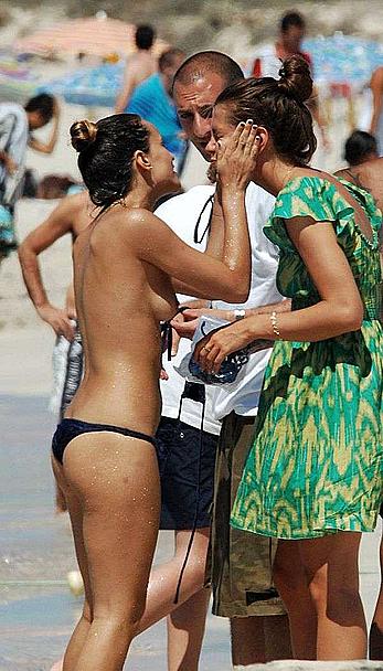 Alice Dellal topless on the beach paparazzi shots