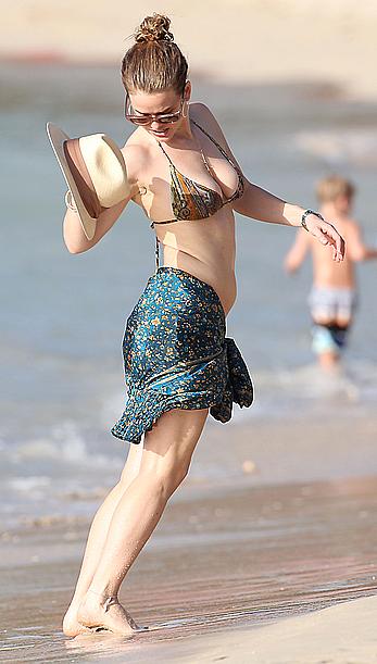 Alice Eve wearing a bikini at a beach in Barbados