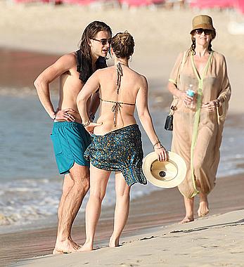 Alice Eve wearing a bikini at a beach in Barbados