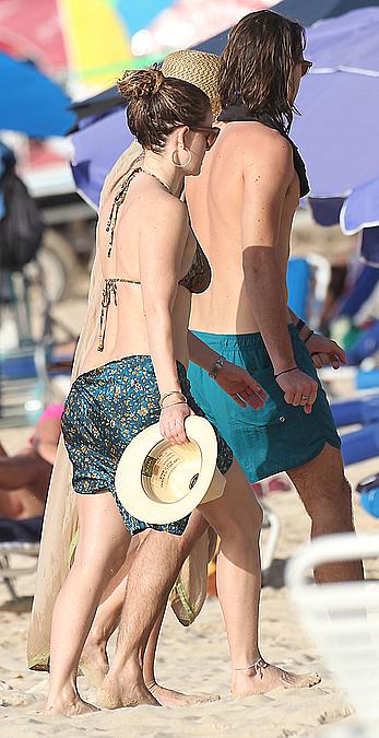 Alice Eve wearing a bikini at a beach in Barbados