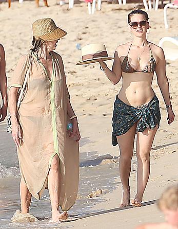 Alice Eve wearing a bikini at a beach in Barbados