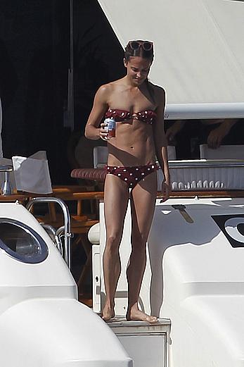 Alicia Vikander swimming in bikini on a yacht