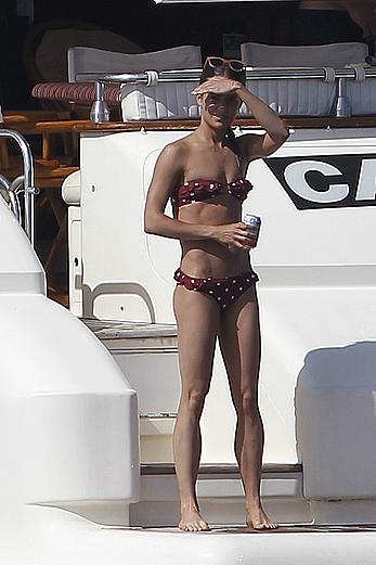 Alicia Vikander swimming in bikini on a yacht