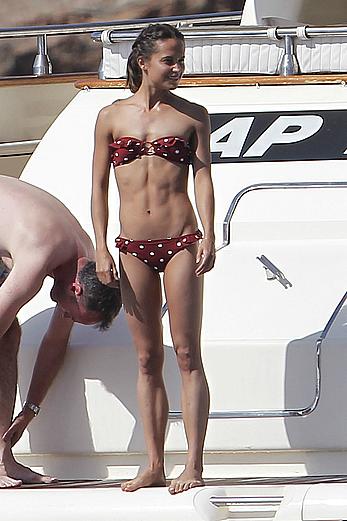 Alicia Vikander swimming in bikini on a yacht