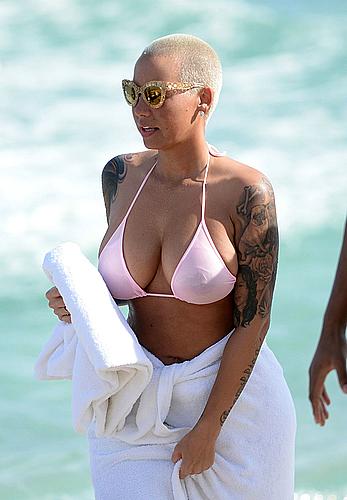 Busty Amber Rose wearing a bikini at a beach in Miami