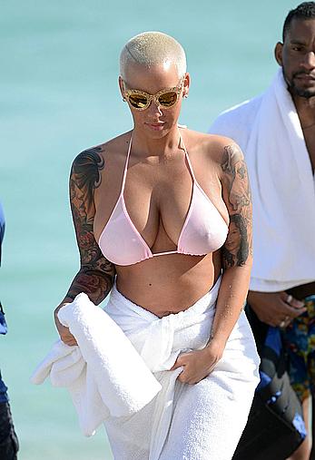 Busty Amber Rose wearing a bikini at a beach in Miami