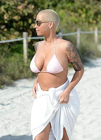 Busty Amber Rose wearing a bikini at a beach in Miami