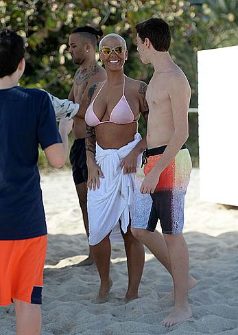 Busty Amber Rose wearing a bikini at a beach in Miami