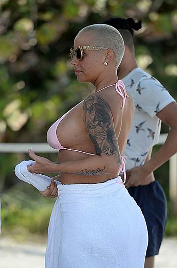 Busty Amber Rose wearing a bikini at a beach in Miami