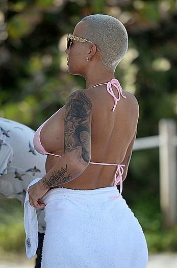 Busty Amber Rose wearing a bikini at a beach in Miami