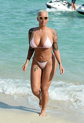 Busty Amber Rose wearing a bikini at a beach in Miami