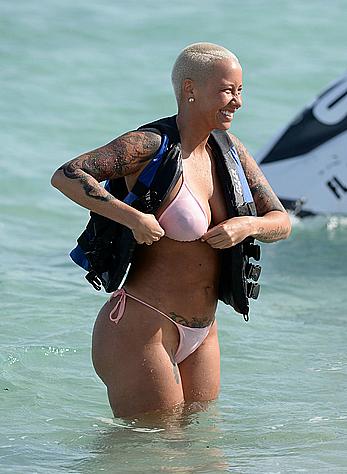 Busty Amber Rose wearing a bikini at a beach in Miami