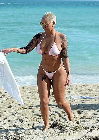 Busty Amber Rose wearing a bikini at a beach in Miami