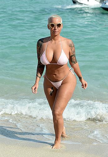 Busty Amber Rose wearing a bikini at a beach in Miami