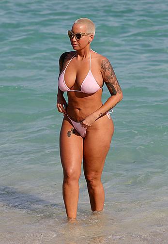 Busty Amber Rose wearing a bikini at a beach in Miami