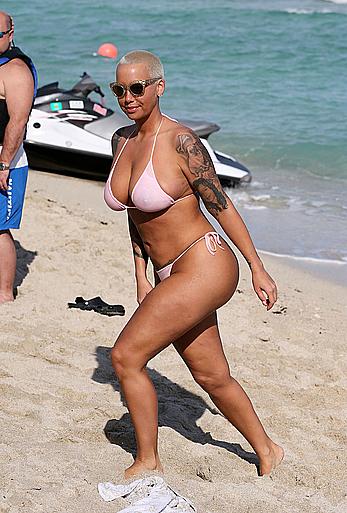 Busty Amber Rose wearing a bikini at a beach in Miami