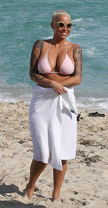 Busty Amber Rose wearing a bikini at a beach in Miami