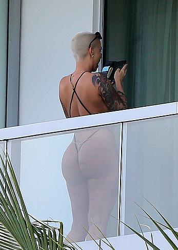 Amber Rose side of boob and big ass on a hotel balcony in Miami