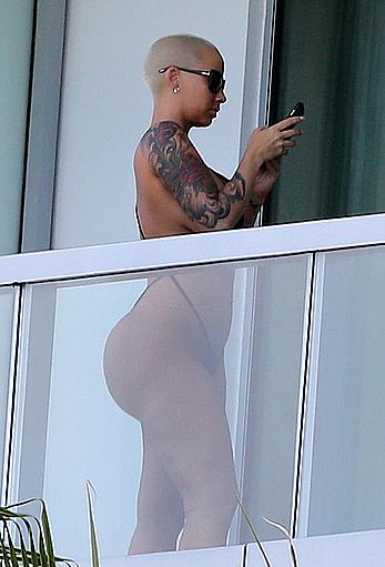 Amber Rose side of boob and big ass on a hotel balcony in Miami