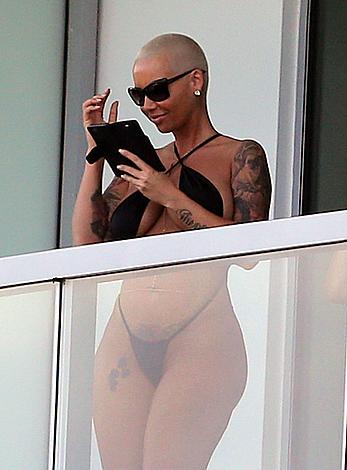 Amber Rose side of boob and big ass on a hotel balcony in Miami