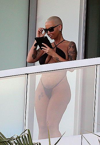 Amber Rose side of boob and big ass on a hotel balcony in Miami